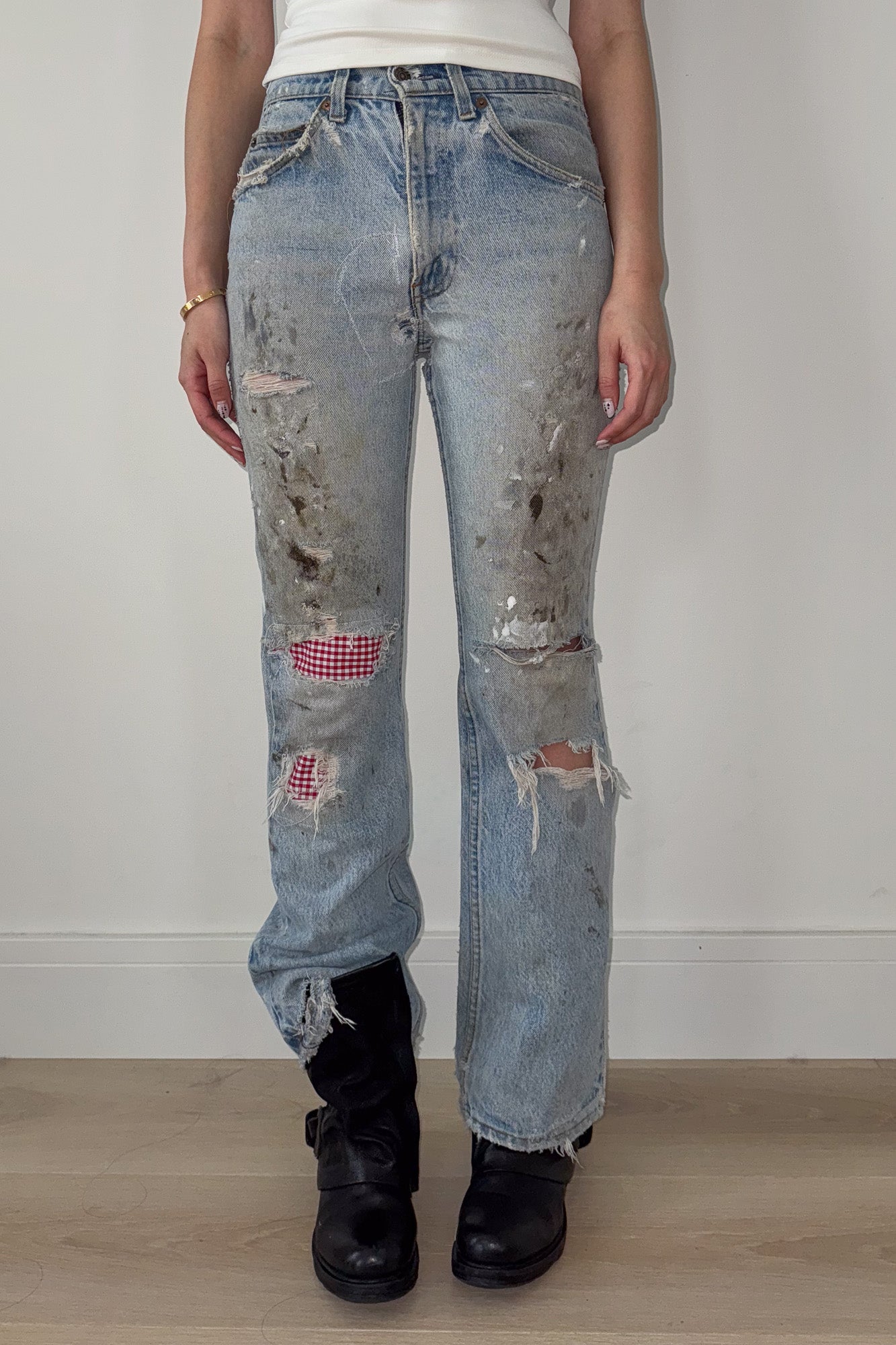 levi's | distressed jeans with gingham repair