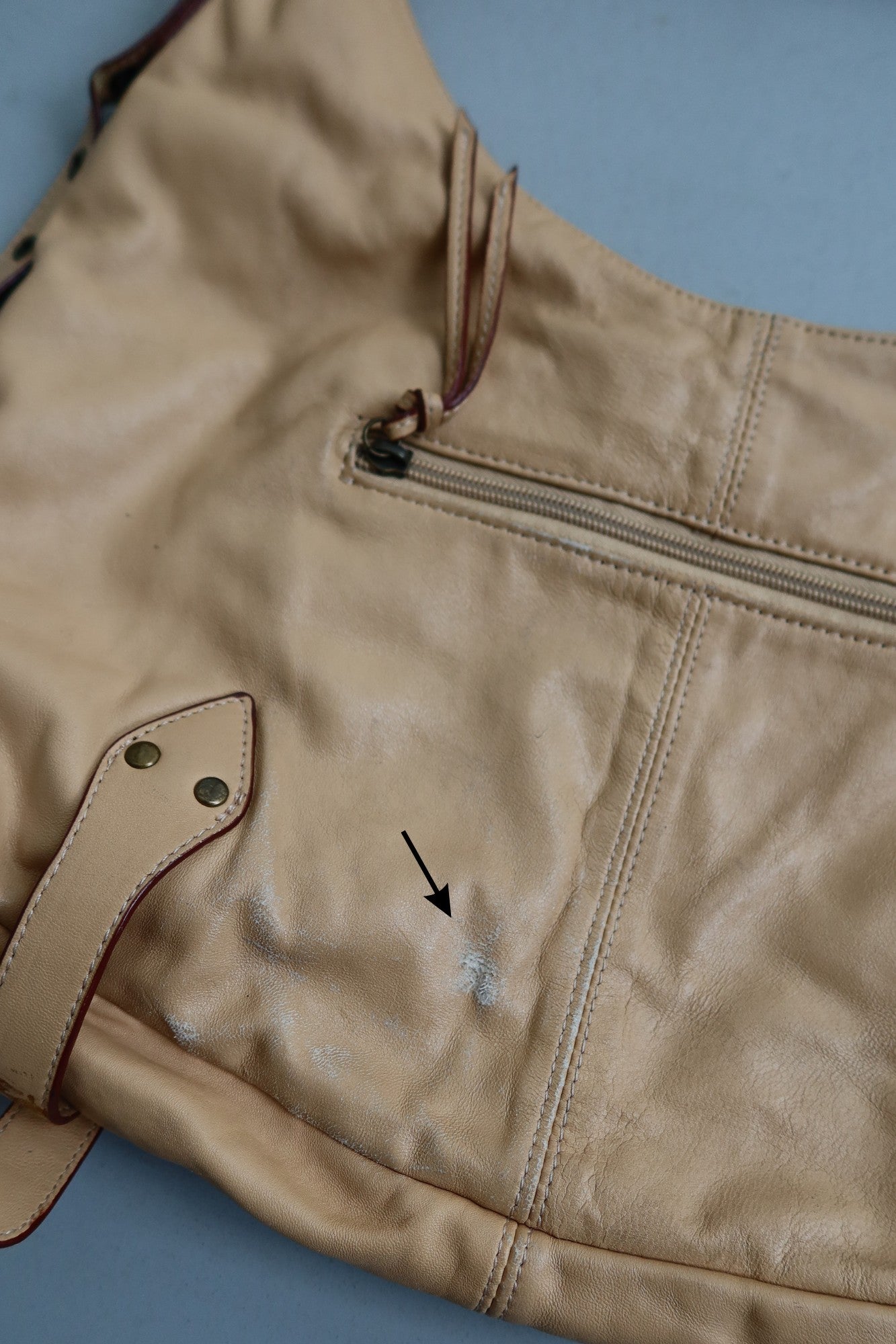 tan leather buckle bag
