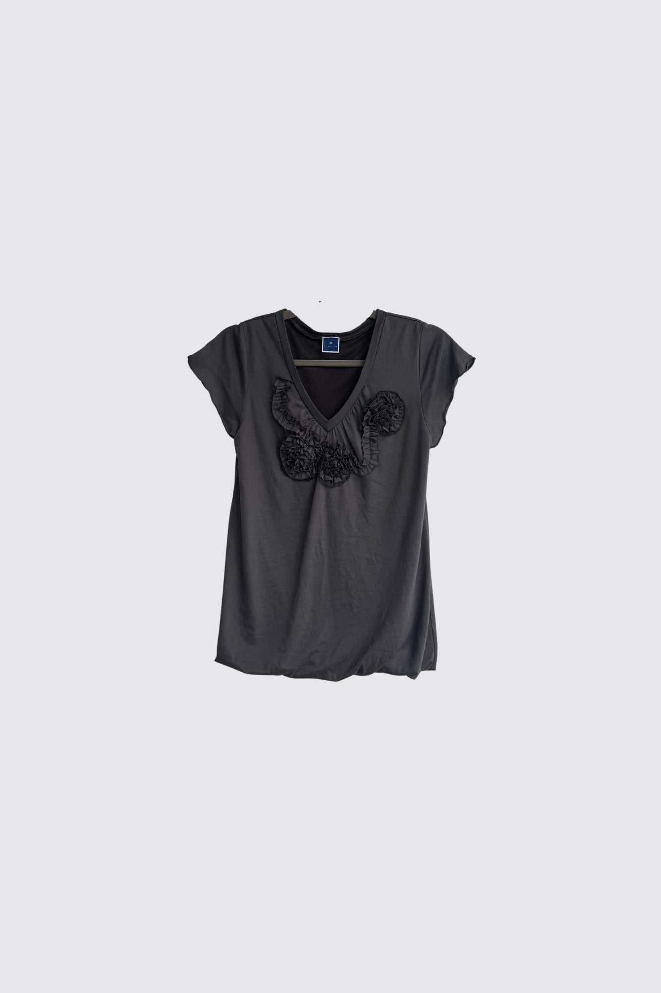grey rosette top