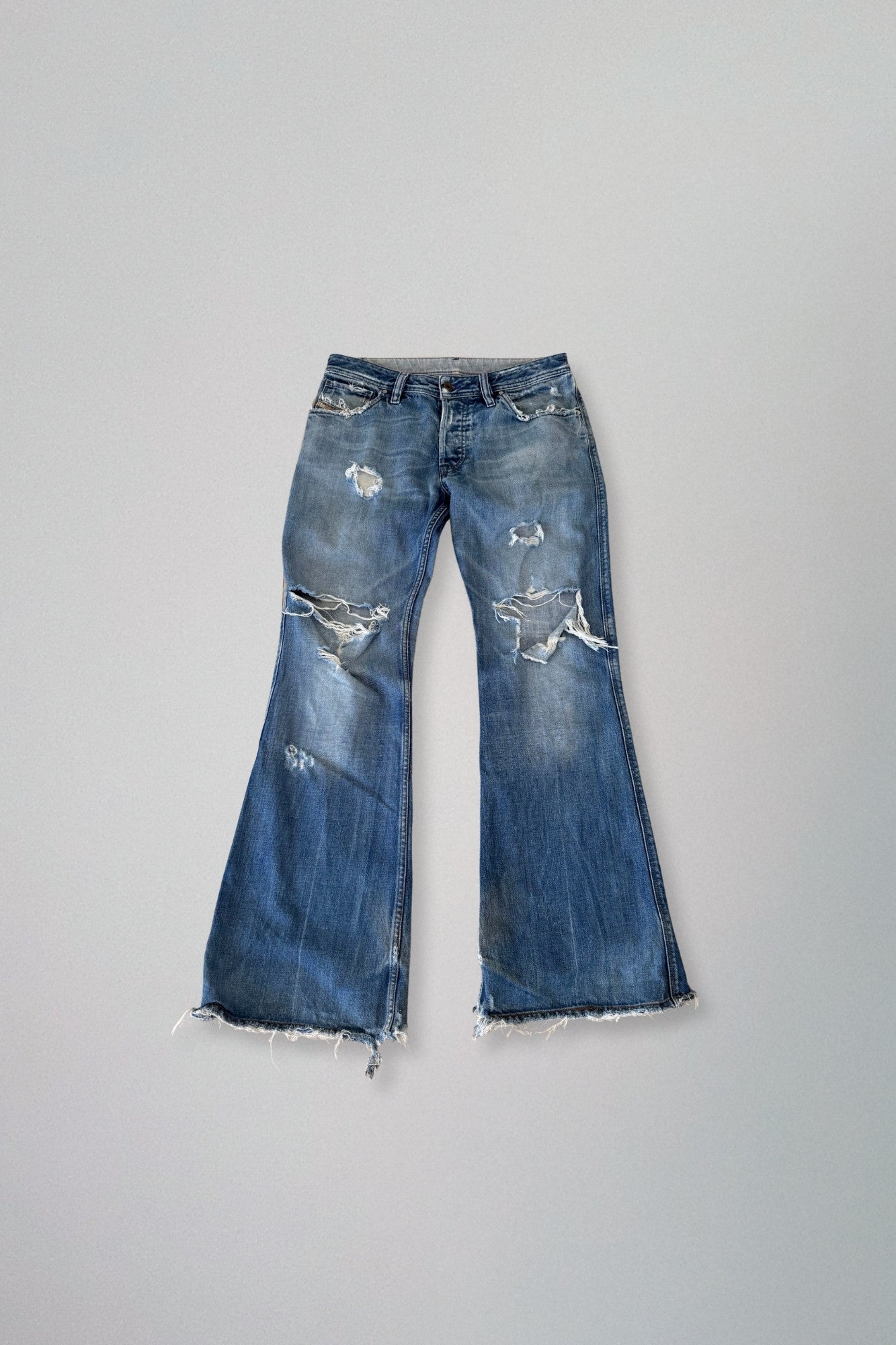 diesel | low waisted distressed jeans