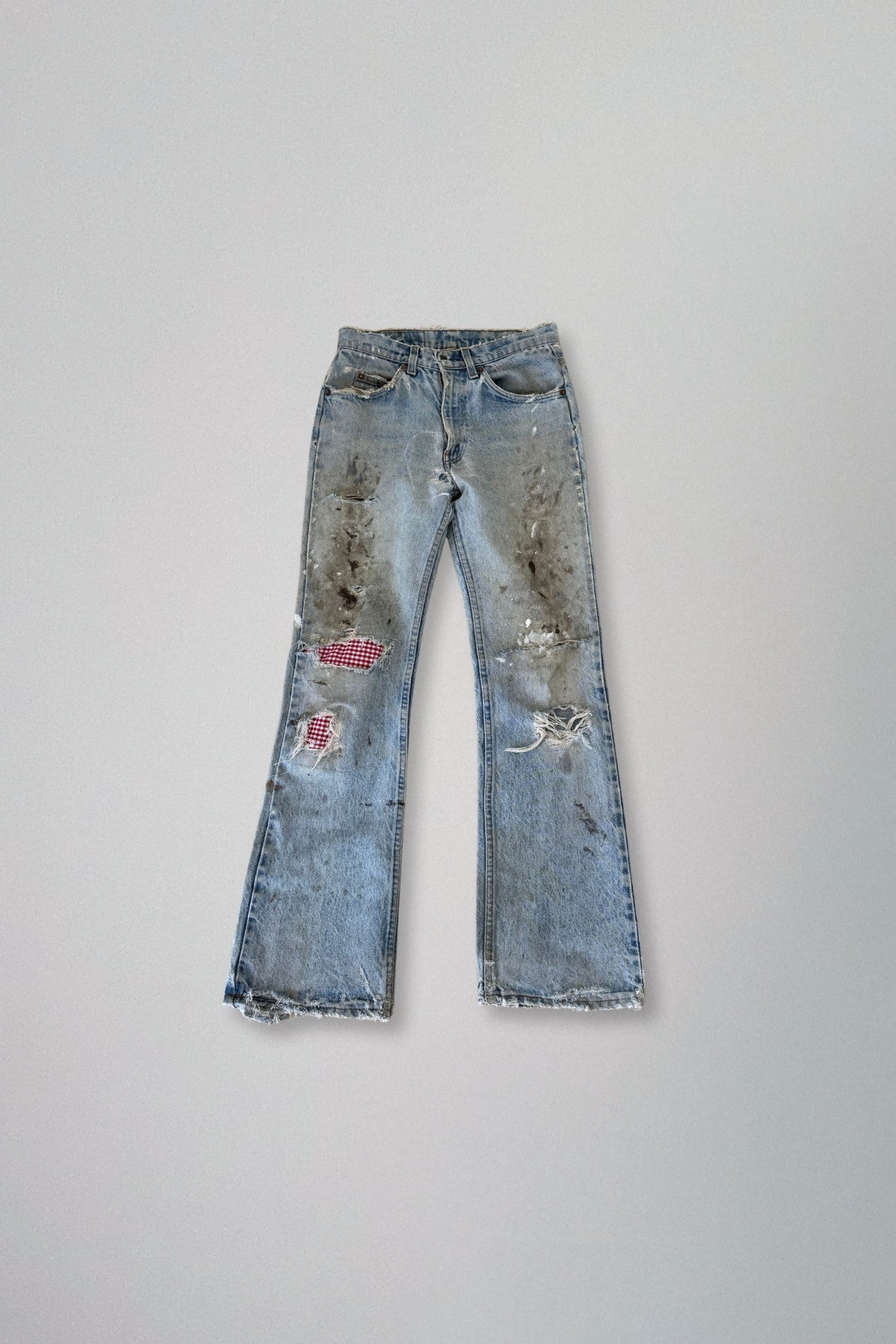 levi's | distressed jeans with gingham repair
