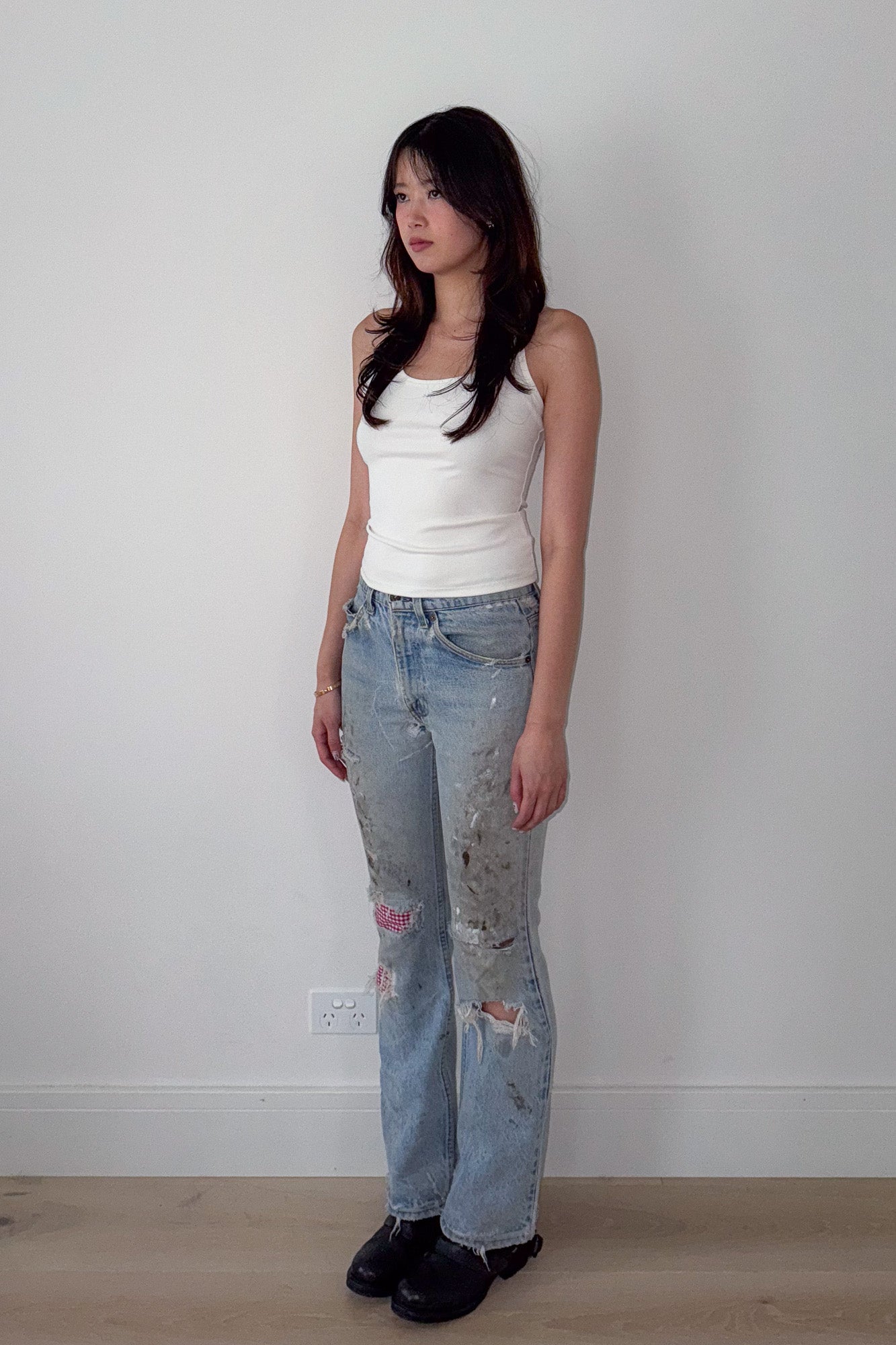 levi's | distressed jeans with gingham repair