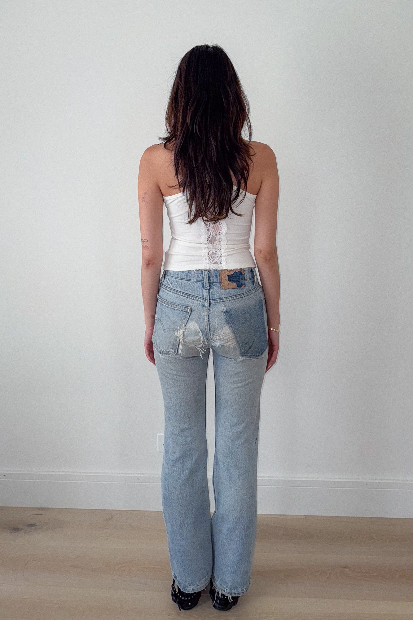 levi's | distressed jeans with gingham repair