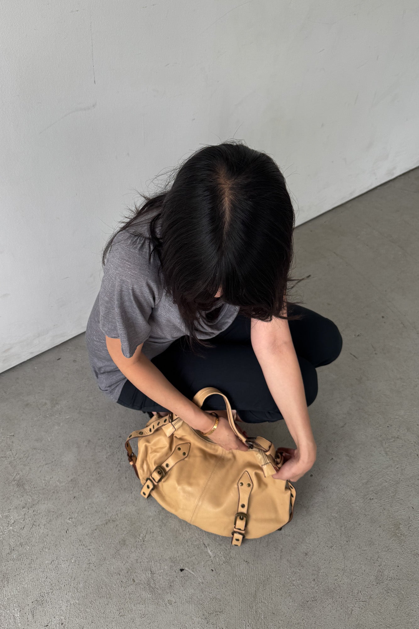 tan leather buckle bag