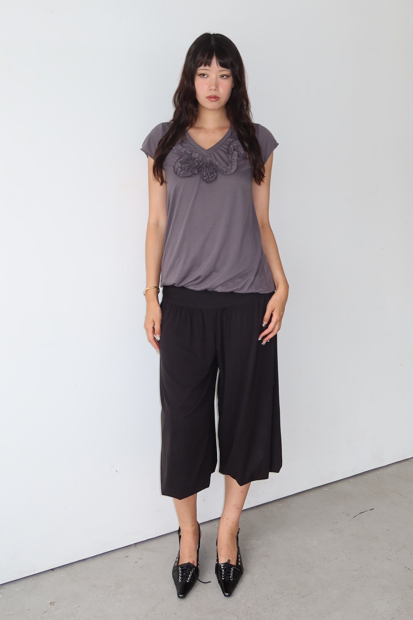grey rosette top
