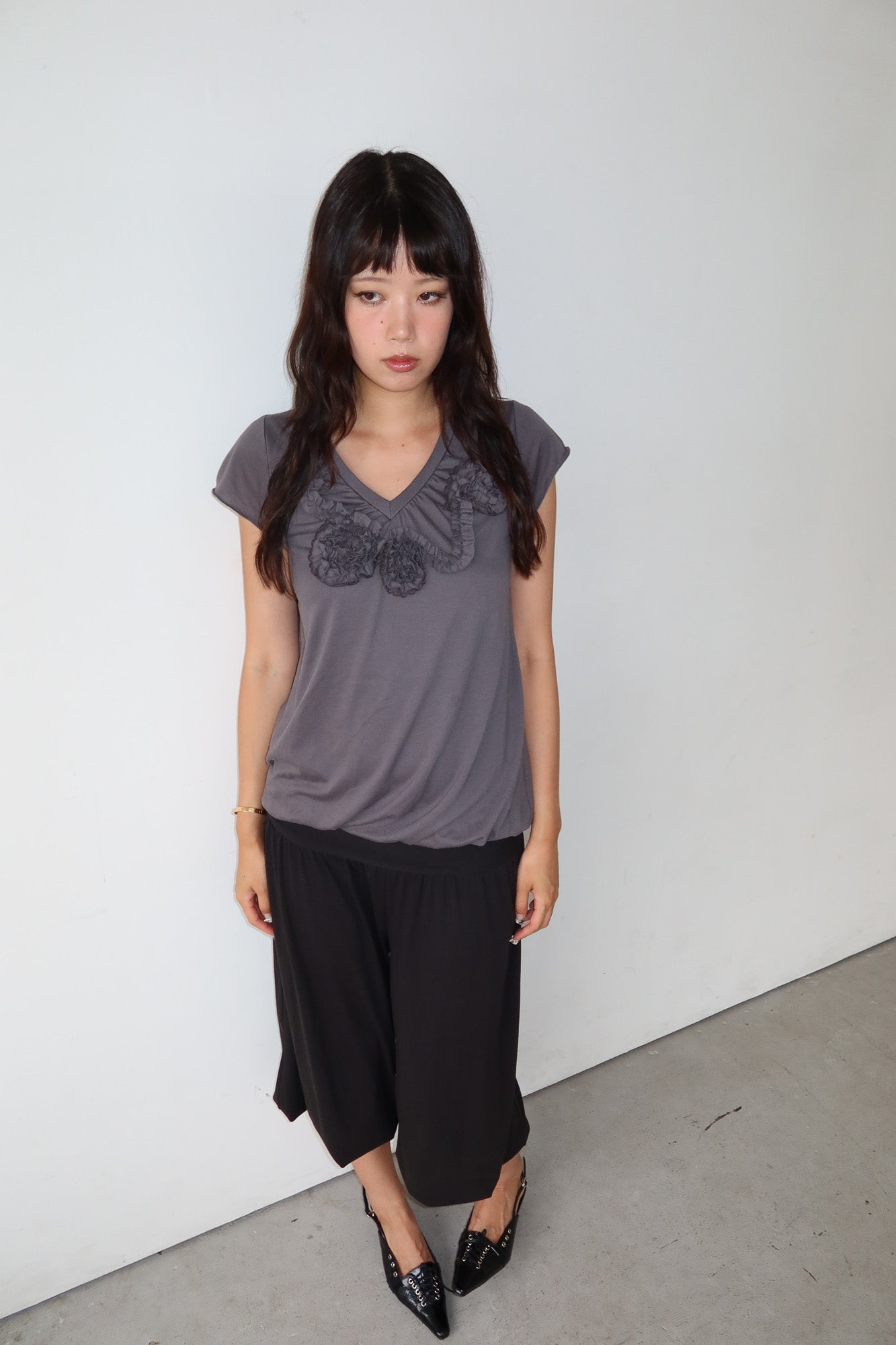 grey rosette top