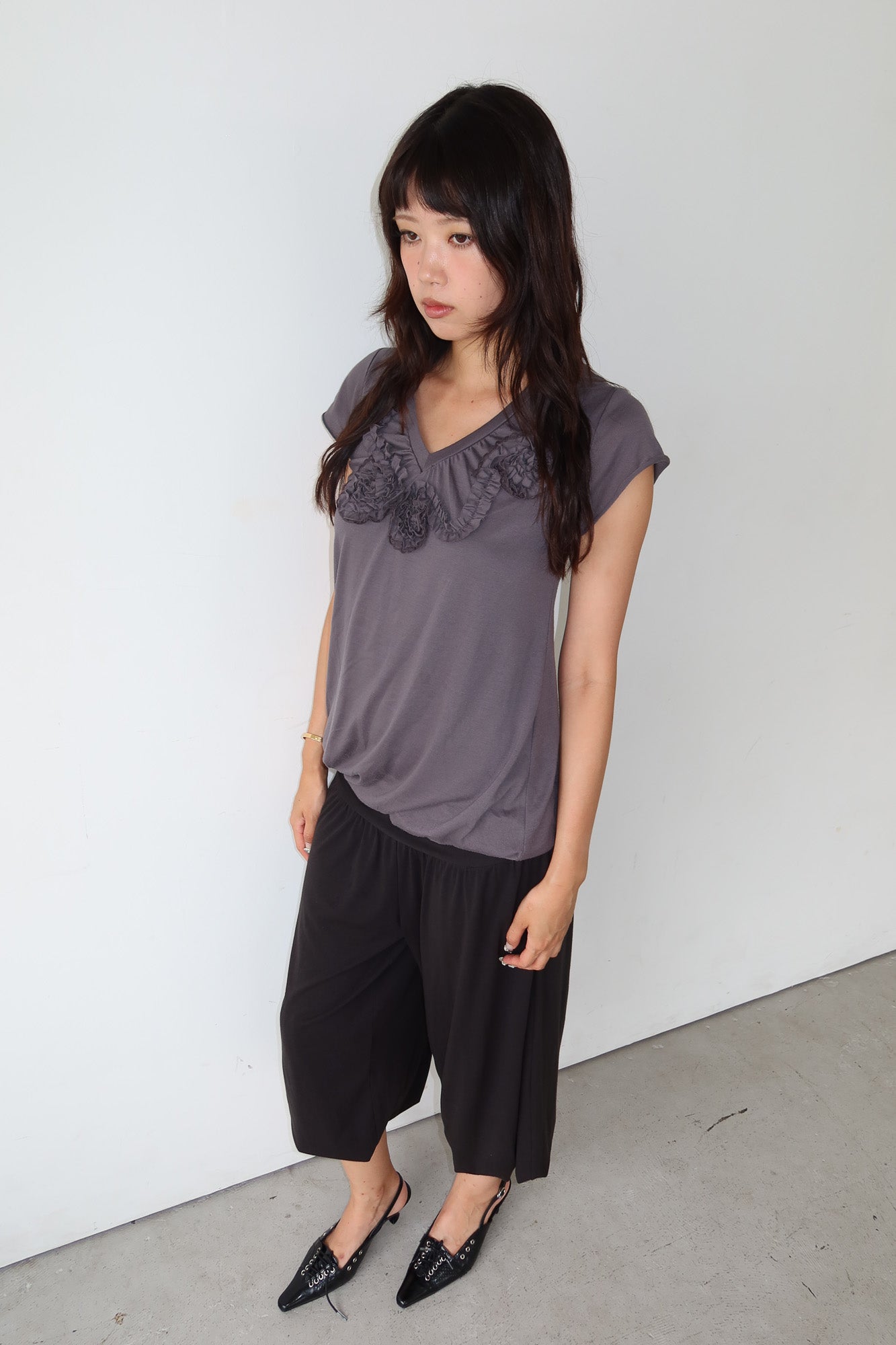 grey rosette top